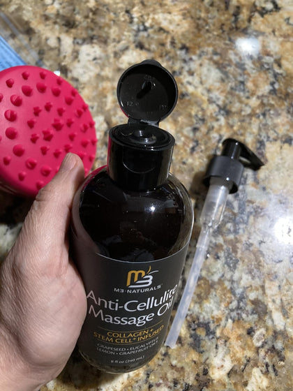 Customer holding the M3 Naturals product